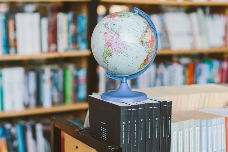 Globe with books